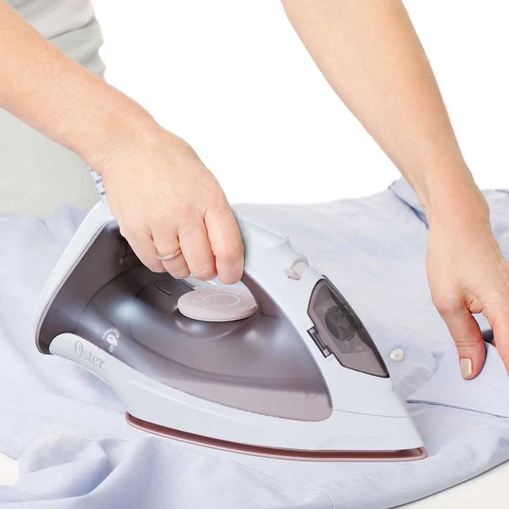 Plancha de ropa a vapor Oster control temperatura anti-adherente
