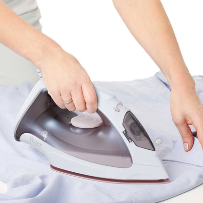 Plancha de ropa a vapor Oster control temperatura anti-adherente