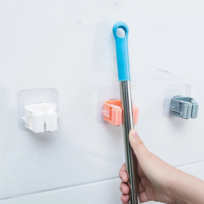 Gancho soporte adhesivo para colgar escoba y trapera